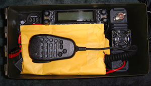 Microphone gets stored in padded envelope. Protects the mic and cushions everything else.