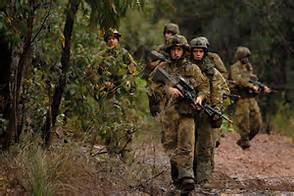 bad guys stalking man in forest
