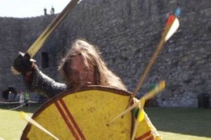 a king fights to defend his castle